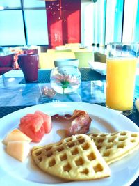 Close-up of breakfast served on table