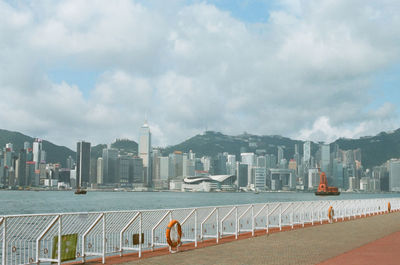 Modern buildings in city against sky