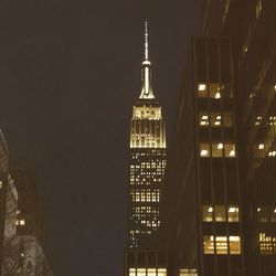 Low angle view of building against sky at night