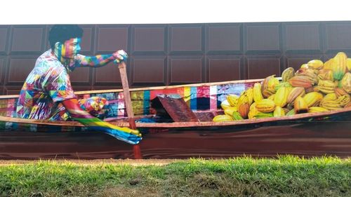 Full frame shot of multi colored candies in boat