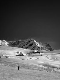 Snow-covered slopes ski resort black and white image