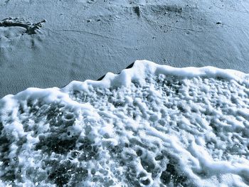 High angle view of snow covered land