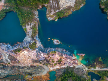 High angle view of rocks and sea