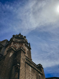 Low angle view of old building against sky