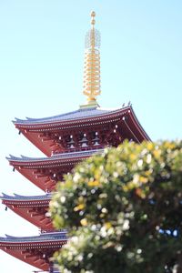 Low angle view of pagoda against sky