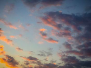 Low angle view of dramatic sky during sunset