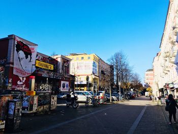 View of city street against clear sky
