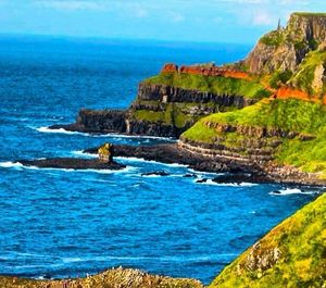 Scenic view of sea against blue sky