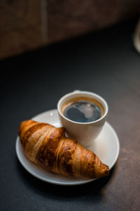 Croissant with coffee