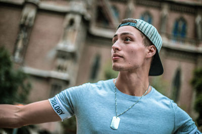 Portrait of young man looking away