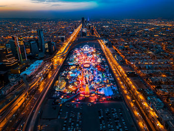 High angle view of illuminated cityscape during the sunset