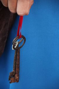 Close-up of a hand holding key