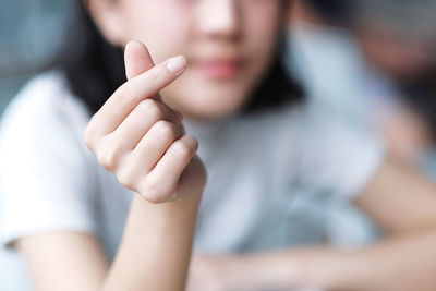 Cropped image of woman hand