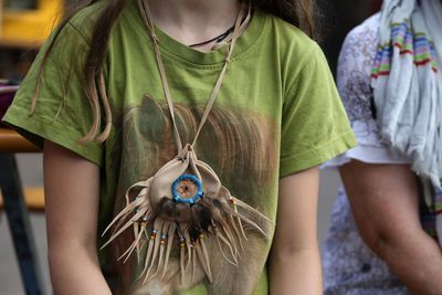 Close-up of girl with hands