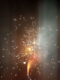 Firework display at night