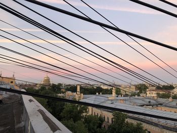View of bridge in city against sky