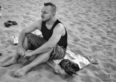 Man sitting at beach