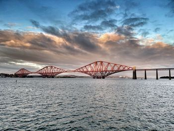 Dramatic skies over forth road rail bridge