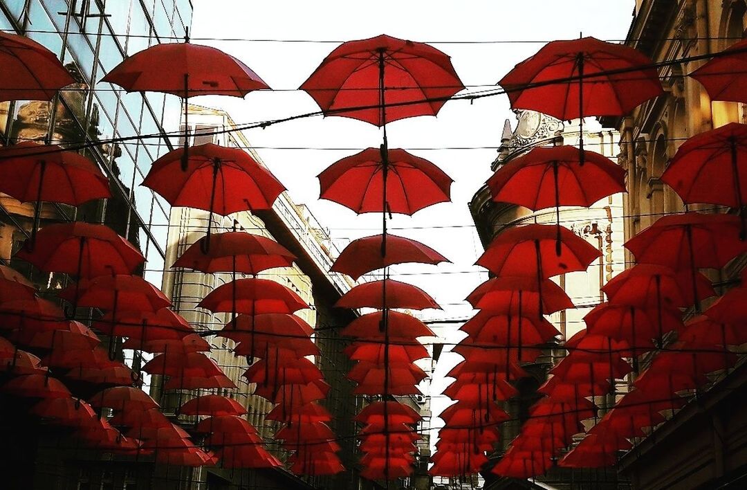 LOW ANGLE VIEW OF LANTERNS AGAINST SKY