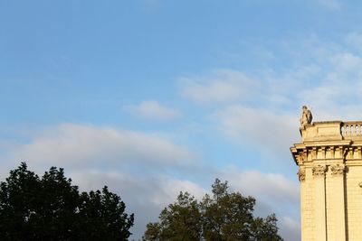 Low angle view of statue against sky