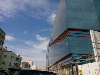 Low angle view of modern building against sky