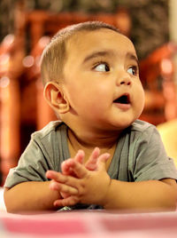 Portrait of cute boy looking away