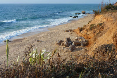 Scenic view of beach and sea against sky