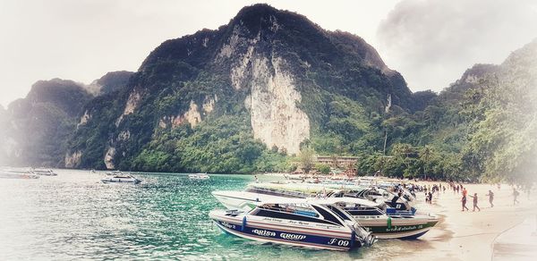 Panoramic shot of rocks in sea against sky