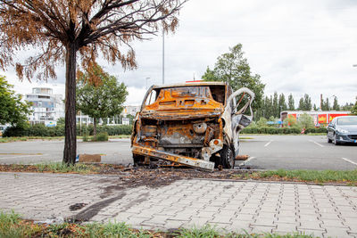 Minibus after a fire, burnt body and interior of the car. burnt rusty car after fire or accident