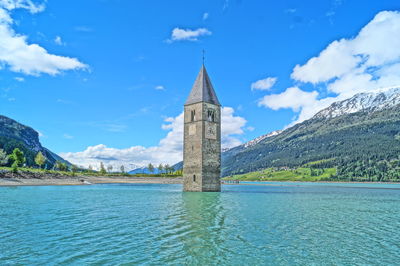 Built structures against blue sky