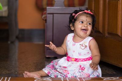 Portrait of cute girl at home