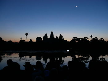 Silhouette of building at sunset