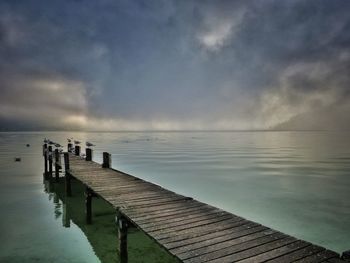 Pier on sea against sky