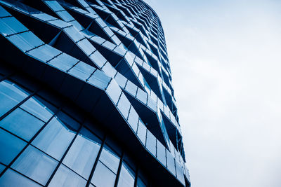 Low angle view of modern building against sky