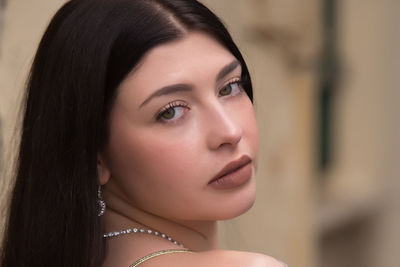 Close-up portrait of young woman