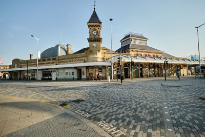 Exterior of eastbourne town centre train station. early morning in bright sunshine.