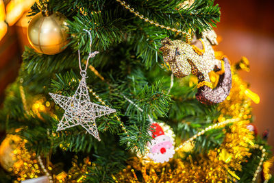 Close-up of christmas decorations on tree