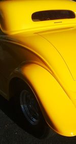 Close-up of yellow car