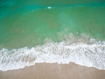 Waves splashing on shore