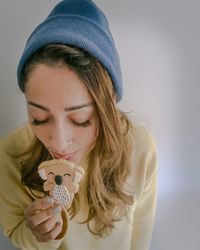 Close-up of beautiful woman with sweet food