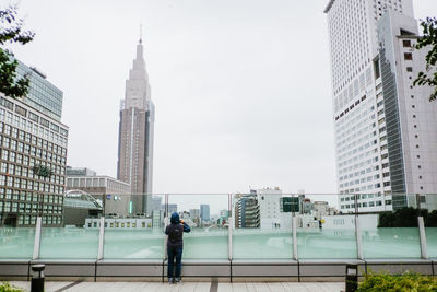 Full length of man standing in city