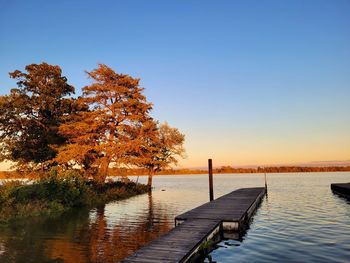 Scenic view of lake against sky during autumn