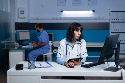 Doctor and nurse working late in hospital