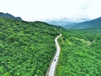 Scenic view of mountain road against sky