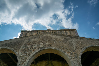 Low angle view of historical building against sky