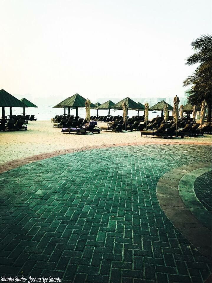 VIEW OF SWIMMING POOL BY SEA