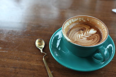 Coffee cup on table