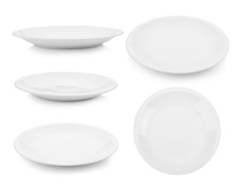 Directly above shot of ceramic plates against white background