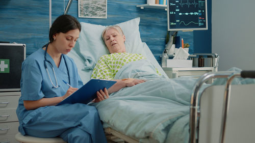 Doctor consulting patient at hospital