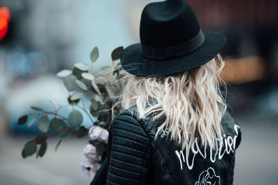 Rear view of woman wearing hat